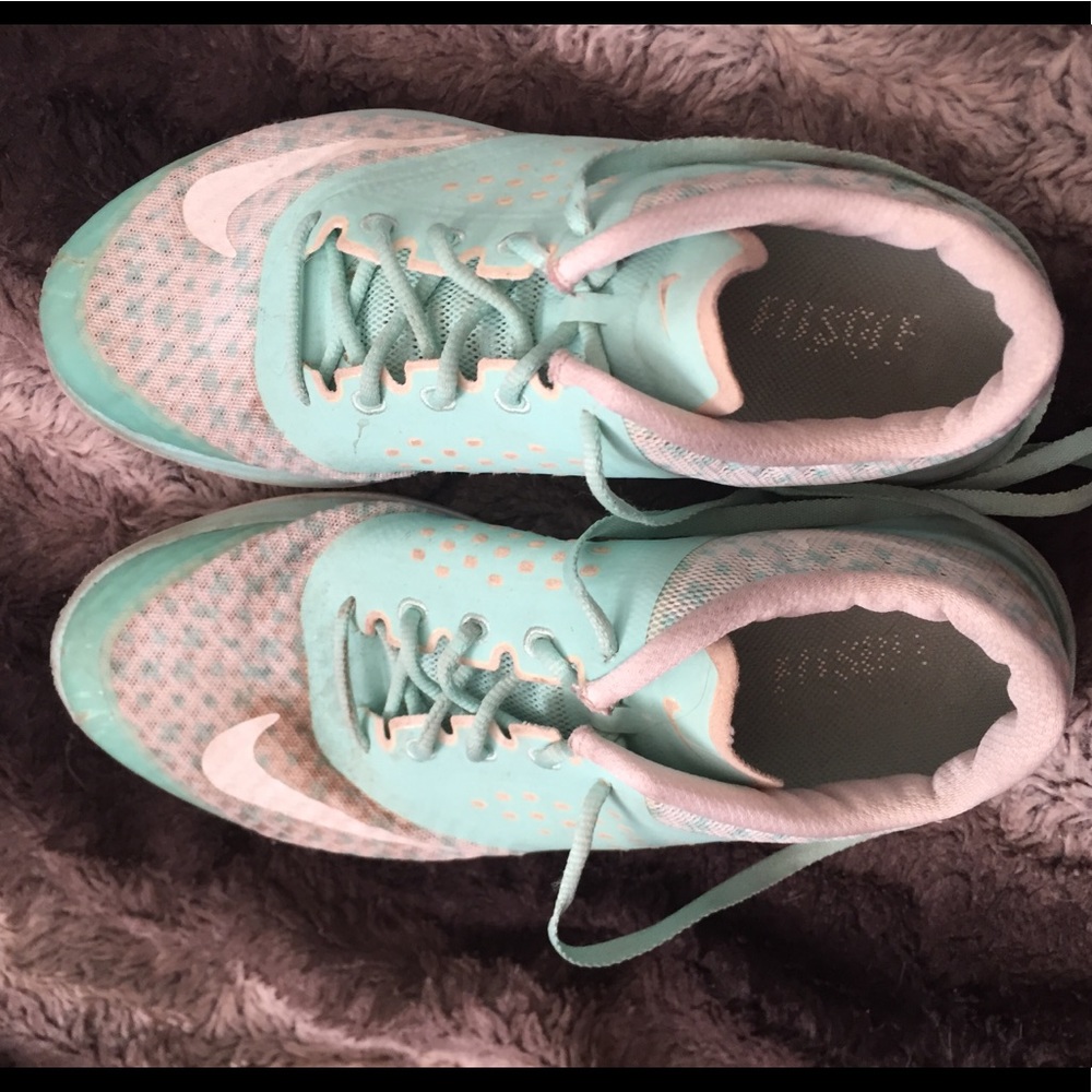 4/$25 Teal Nike running shoes